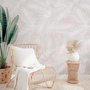 Papier peint panoramique de feuilles de palmier roses et tropicales