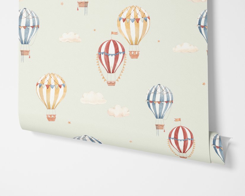Watercolor blue wallpaper with hot air balloons, cream clouds and peach stars on pale sage green