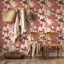 Tropical foliage wallpaper with black panthers, pink palace facades and ochre palms on pale peach