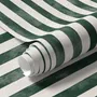 Green striped minimalist wallpaper with vertical deep forest green bands on a soft warm ivory ground.