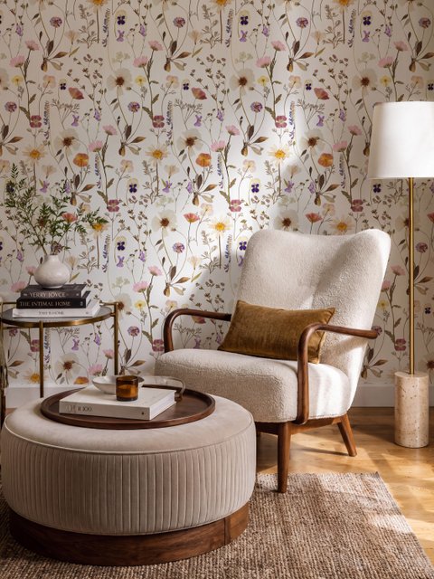Cute spring wallpaper with pressed ivory, pink, blue and yellow wildflowers on a white ground