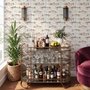 Watercolor fish wallpaper with trout, seashells and pale aqua washes on a warm cream ground