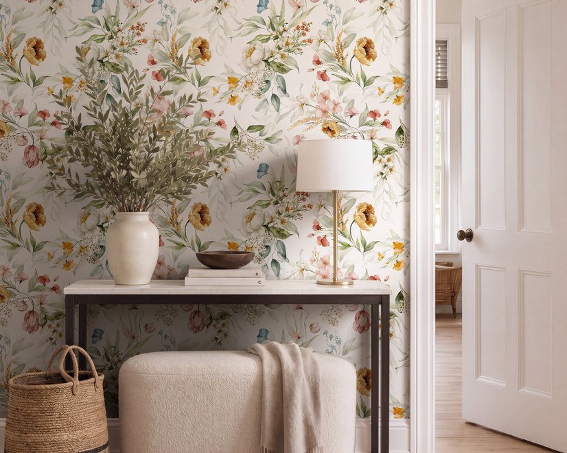 Watercolour floral wallpaper with sage leaves, blush and ochre flowers on a white ground