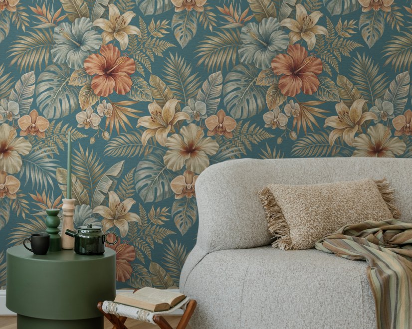 Blue tropical wallpaper with hibiscus, orchids, lilies, monstera leaves and palm fronds on a deep teal-blue ground