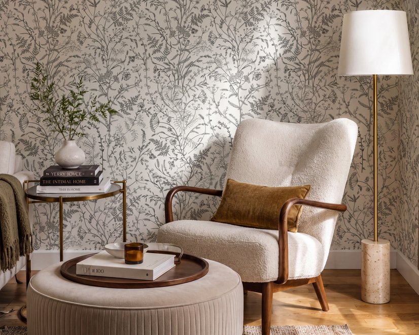 Black outline botanical wallpaper with charcoal wildflowers and grasses on a warm ivory cream ground