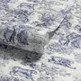 Jungle wallpaper with animals in navy toile, showing tigers, elephants and monkeys on an ivory cream ground