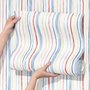 Blue and light blue wallpaper with hand-painted vertical watercolour stripes on a clean white ground
