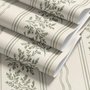 Green aesthetic wallpaper with sage leafy sprigs, fine vertical rules and dotted borders on cream ivory