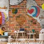 Hot Air Balloon with Young People on Brick Wallpaper Mural