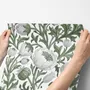 Sage green botanical floral wallpaper with white poppy flowers, lobed leaves and dotted seed centres