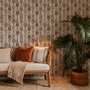 Vintage city wallpaper with illustrated European townhouses, lamps, bicycles, benches and orange-gold trees