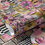 Bold wallpaper for powder room with pop art female faces, pink flowers, black comic panels, mustard, teal and fuchsia details