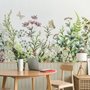 Fototapete Wilde Blumen und frische grüne Blätter