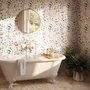 Watercolour floral wallpaper repeat with navy, blue, blush and peach wildflowers on warm cream