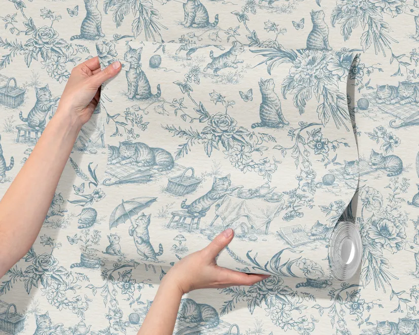 Cute cats wallpaper with dusty blue toile kittens, roses and garden scenes on warm cream