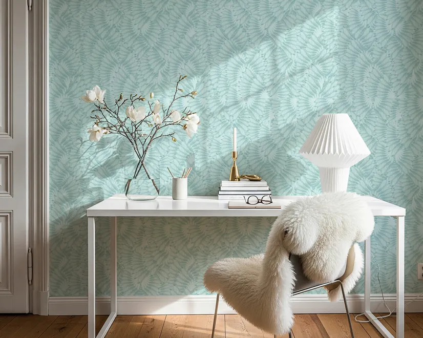 Aqua fern wallpaper with overlapping icy blue palm fronds on a pale aqua ground