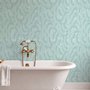 Aqua fern wallpaper with overlapping icy blue palm fronds on a pale aqua ground
