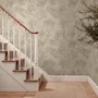 Abstract taupe and greige wallpaper with creamy white oval brush marks in flowing currents