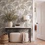 Monochrome wallpaper with grey tree toile on a clean white ground