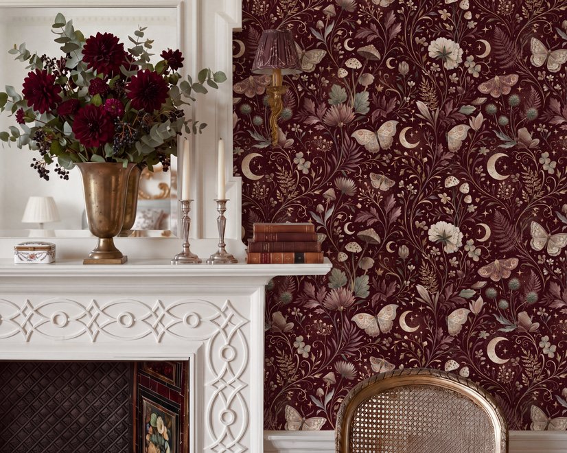 Pink butterflies wallpaper on a claret ground with cream flowers, moons, stars and spotted mushrooms.