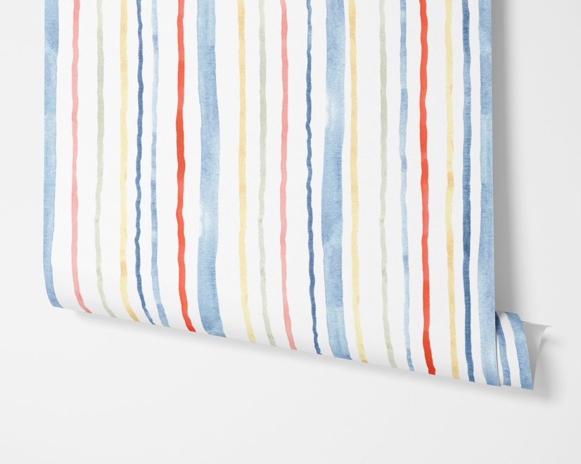 Blue and light blue wallpaper with hand-painted vertical watercolour stripes on a clean white ground