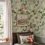 Celadon-sage chinoiserie wallpaper with blue-grey birds, tan branches, pink peonies and white orchids