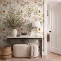 Watercolour floral wallpaper with sage leaves, blush and ochre flowers on a white ground