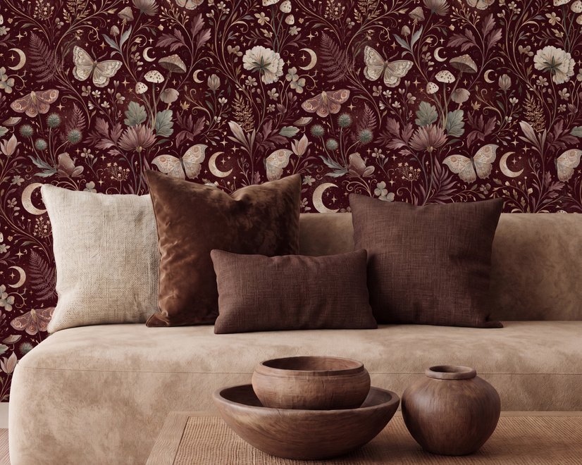 Pink butterflies wallpaper on a claret ground with cream flowers, moons, stars and spotted mushrooms.