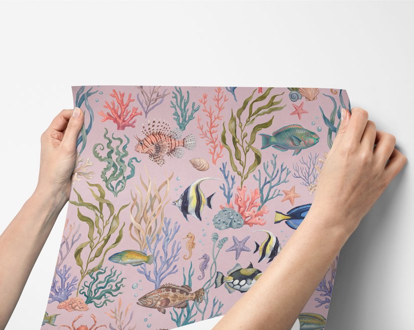 Cute pink seashell wallpaper with watercolour reef fish, coral, seaweed, starfish and shells on blush pink