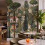 Architectural design wallpaper mural of forest treehouses, rivers, boats and small figures in green watercolour
