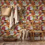 Floral and fish wallpaper with coral blooms, teal fish and black white flowers on metallic mustard-gold ground