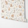 Woodland nursery wallpaper pattern with watercolour fawns, fox cubs, rabbits, teddy bears, birds and ducklings on cream