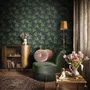 Dark green wallpaper with metallic antique-gold etched ginkgo leaves on a textured forest-green teal ground
