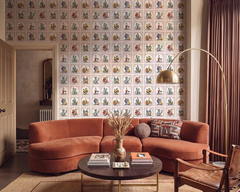 Bar wallpaper with cream tile grid, dusty rose arches, illustrated wine bottles, fruit and café still lifes