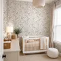 Black outline botanical wallpaper with charcoal wildflowers and grasses on a warm ivory cream ground