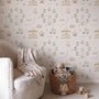 Children's playroom wallpaper with pastel Ferris wheel, carousel horses, tents and balloons on blush pink