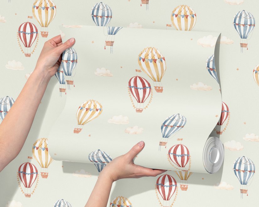 Watercolor blue wallpaper with hot air balloons, cream clouds and peach stars on pale sage green