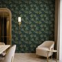 Dark green wallpaper with metallic antique-gold etched ginkgo leaves on a textured forest-green teal ground
